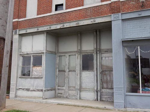 Large door entrances with transoms were usually dropped down, or bricked over